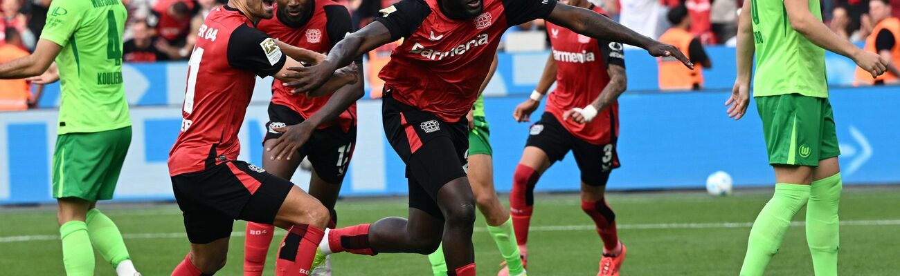 Victor Boniface lässt Bayer mal wieder in der Nachspielzeit jubeln., © Federico Gambarini/dpa