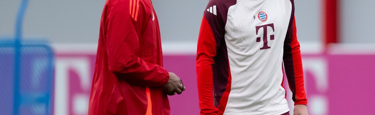 Gut gelaunt beim Training: Trainer Vincent Kompany (l) und Torjäger Harry Kane., © Sven Hoppe/dpa