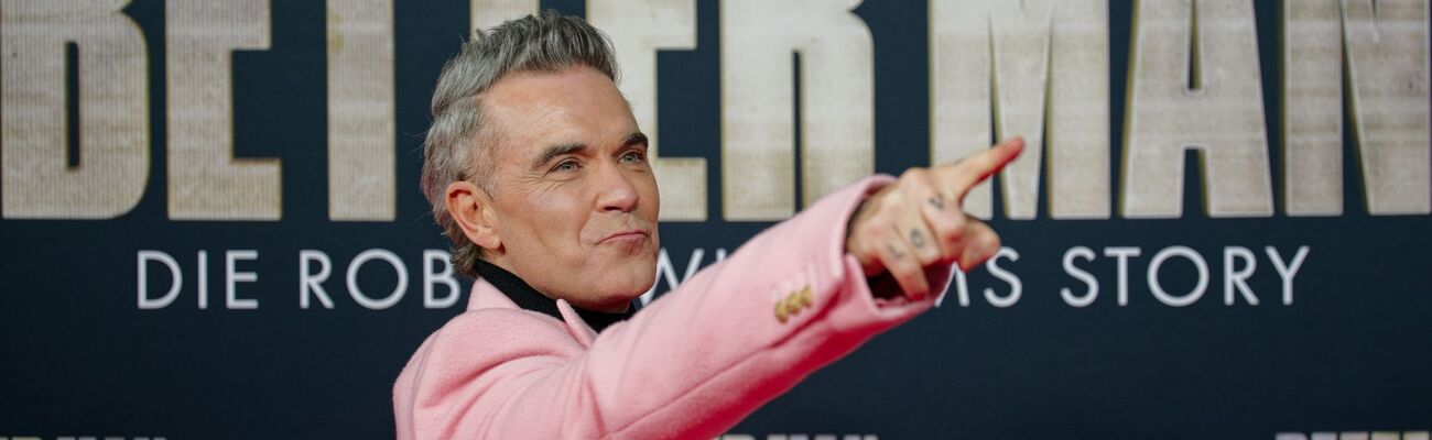 Robbie Williams bei der Premiere., © Henning Kaiser/dpa