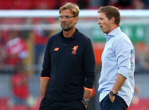 Einst Vereinstrainer, jetzt nicht mehr: Jürgen Klopp und Julian Nagelsmann (r)., © Dave Thompson/AP/dpa