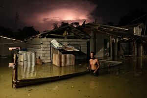 Im November sorgten Taifune vor allem auf den Philippinen für heftige Überschwemmungen. (Archivbild), © Noel Celis/AP/dpa