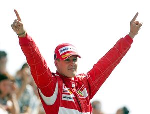 Formel-1-Legende Michael Schumacher, damals Scuderia Ferrari, feiert seinen Sieg beim Großen Preis von Italien in Monza im Jahr 2006. , © Gero Breloer/dpa