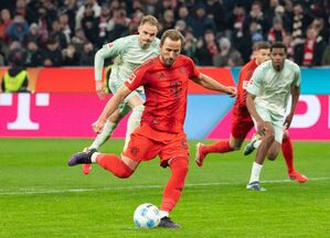 Harry Kane bei seinem 29. Elfmeter-Tor nacheinander zum 3:0-Endstand gegen Werder. , © Magdalena Henkel/dpa